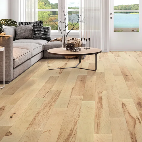 Hardwood floors in a Palm Desert living room, California by Royalty Floors & Blinds